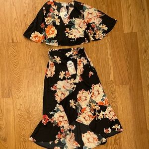 Brand new floral set! Top ties in back. Skirt is flowy and fits beautifully.